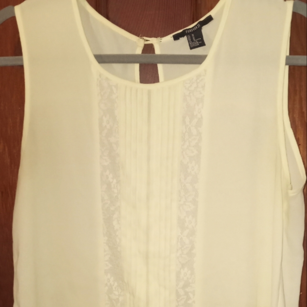 Forever 21 Size Medium Pale Yellow Sleeveless Top.